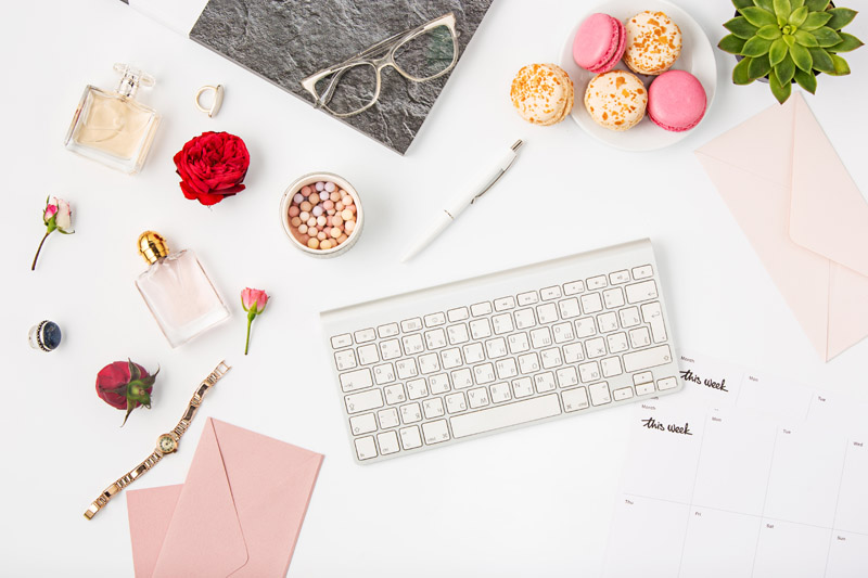 top-view-of-white-office-female-workspace-with-pc-PCJVTC5.jpg